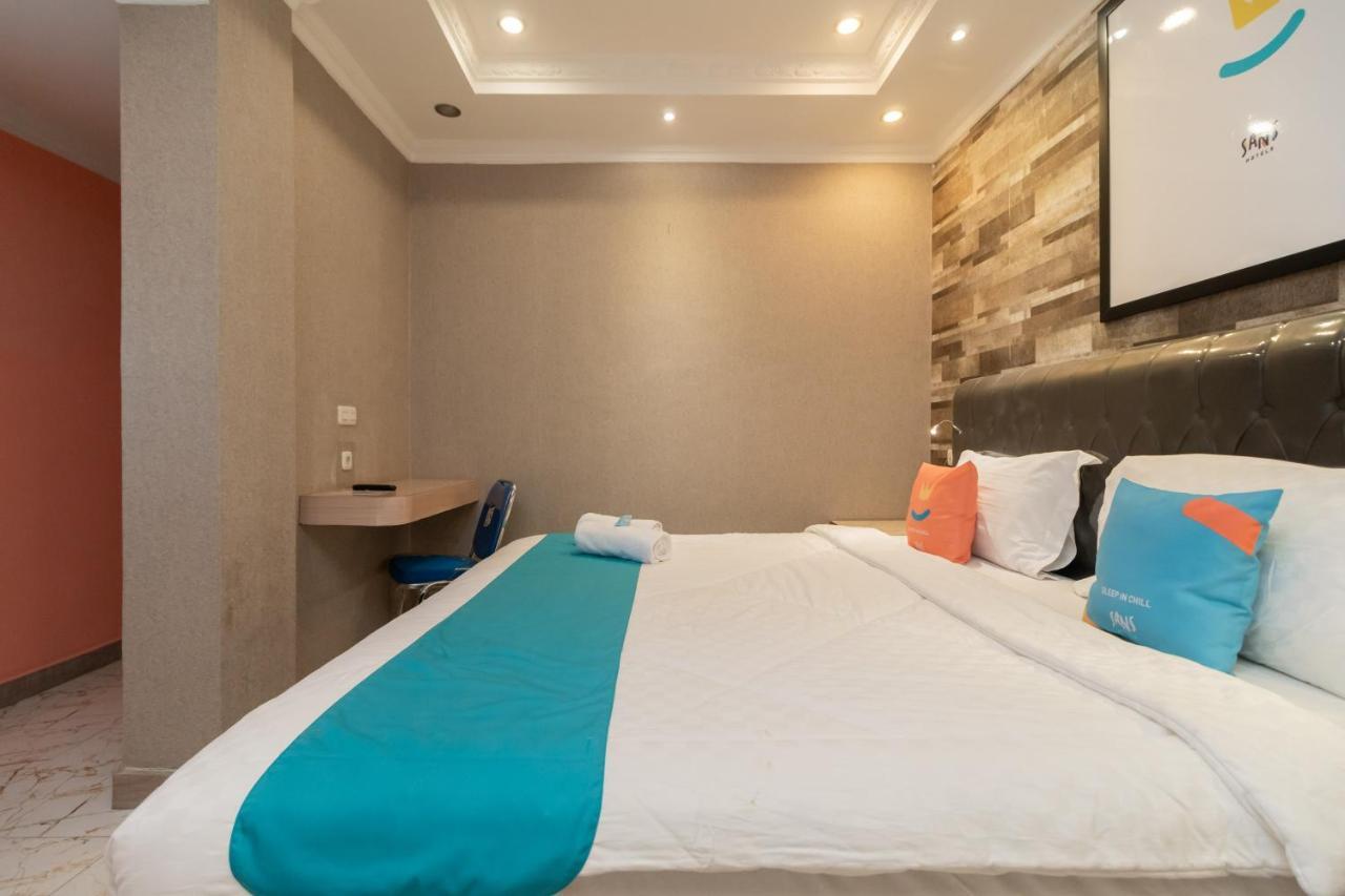 Sans Hotel Beauty Palembang Bagian luar foto