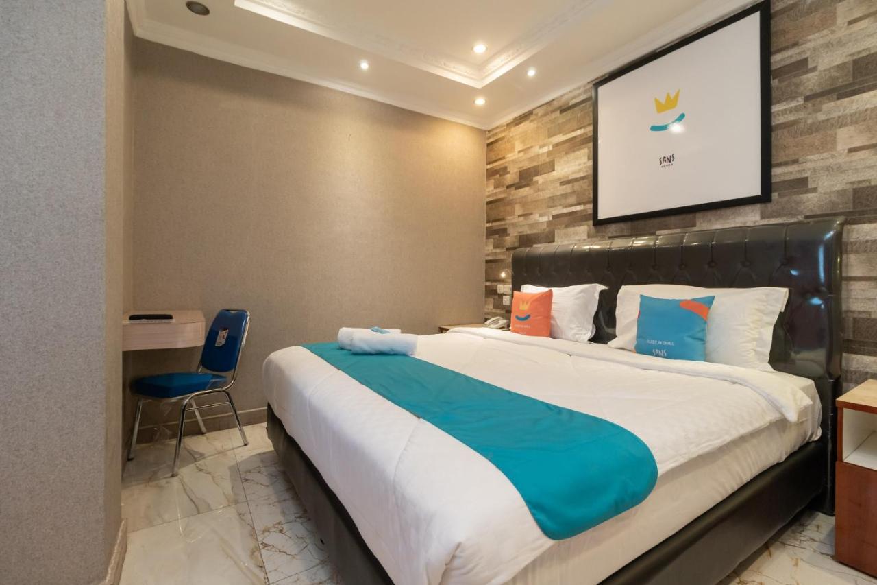 Sans Hotel Beauty Palembang Bagian luar foto