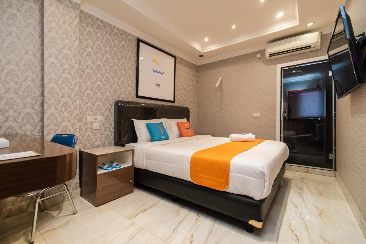 Sans Hotel Beauty Palembang Bagian luar foto