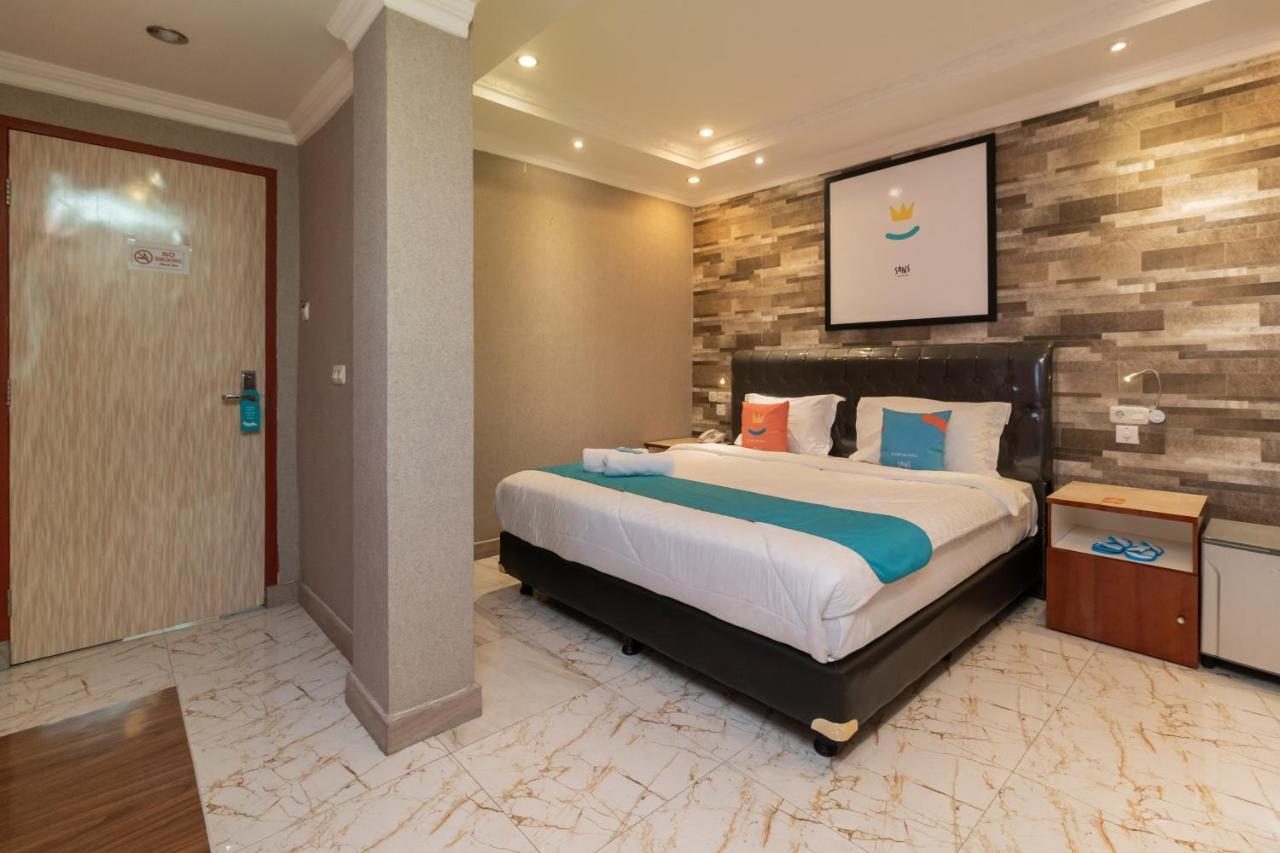 Sans Hotel Beauty Palembang Bagian luar foto